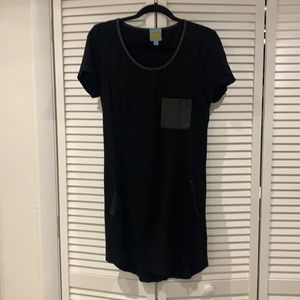 Black dress with leather stitching